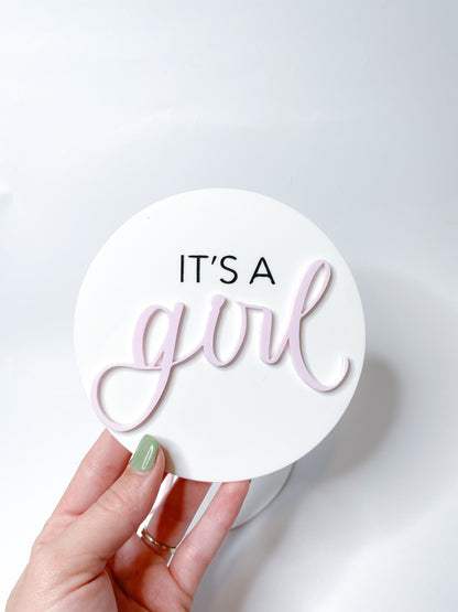 It’s a girl acrylic disk